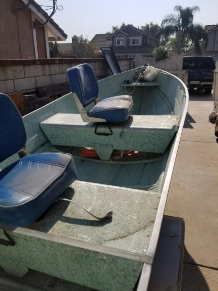 Womens name brand blouses, shorts and pants, PS4 sports games, brand new, new release blu ray dvds and a Sears 'Gamefisher' fishing boat